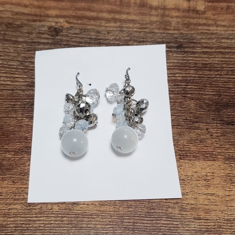 silver tone and white bead dangling statement earrings
